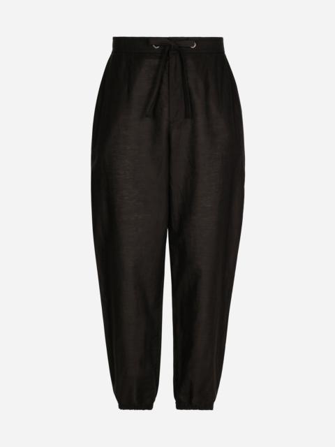 Dolce & Gabbana Linen and cotton jogging pants with logo label