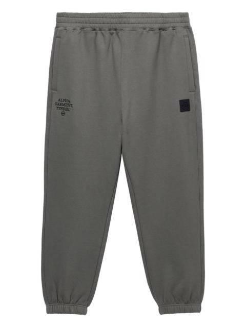 ALPHA INDUSTRIES embroidered-logo cuffed track pants