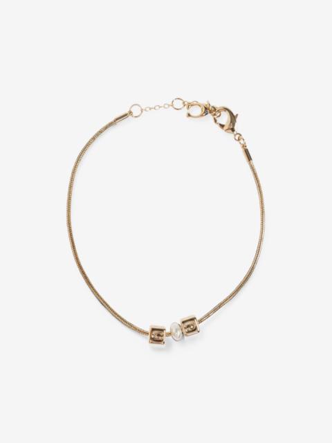 COACH logo-charm faux-pearl bracelet