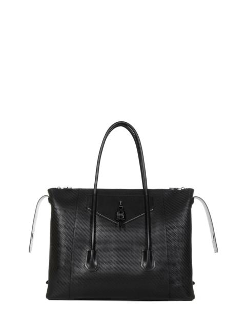 Givenchy Antigona Lock Soft large handbag in black woven leather with 4G lock on the front.