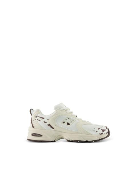 New Balance 530 cow-print sneakers