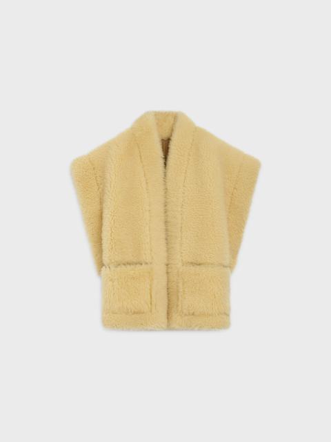 CELINE REVERSIBLE FOLK WAISTCOAT IN SHEARLING