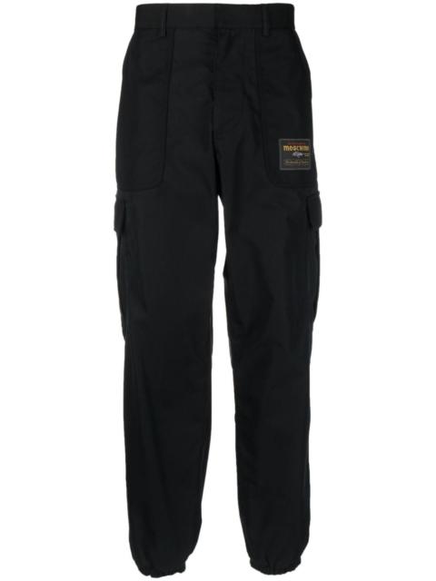Moschino logo-patch cargo trousers