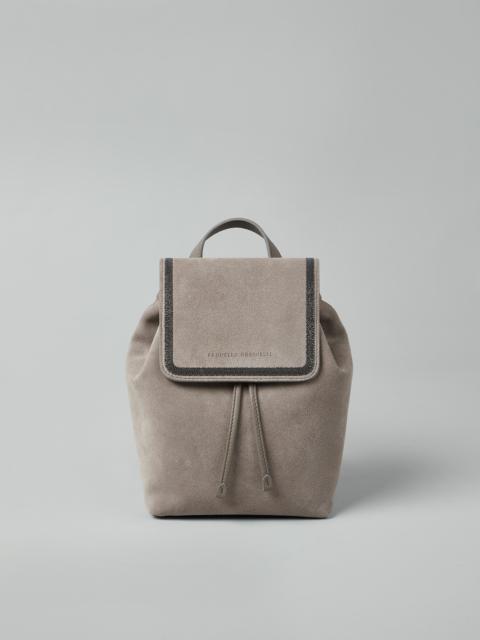 Suede backpack with precious contour