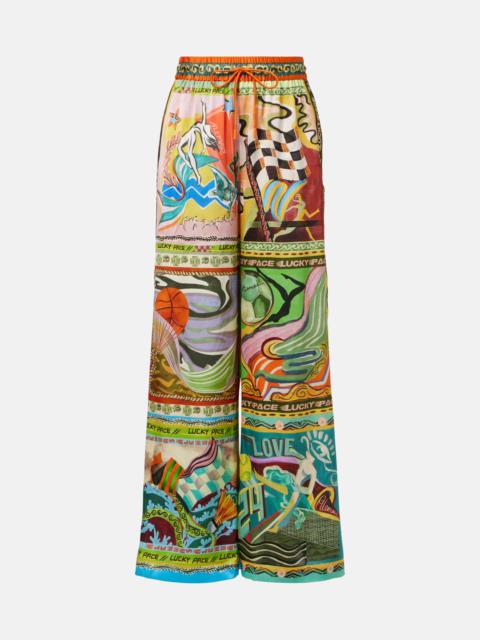 ALÉMAIS Lucky Pace printed silk palazzo pants