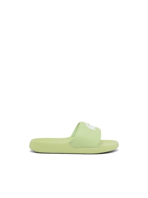 LACOSTE Serve logo slides