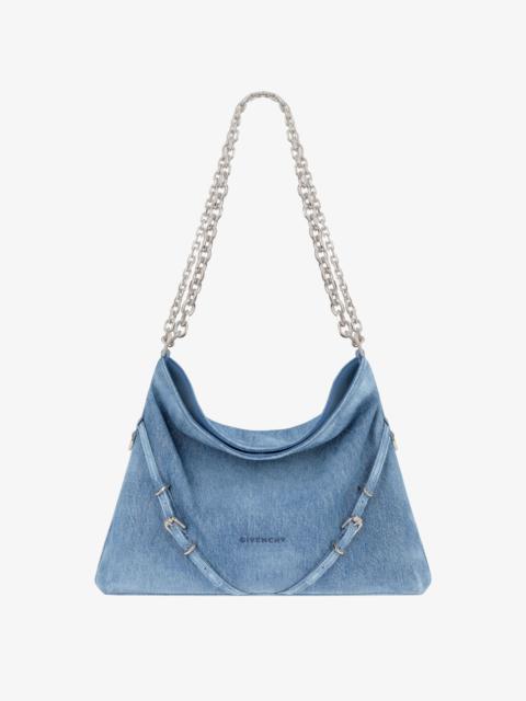 MEDIUM VOYOU CHAIN BAG IN WASHED DENIM