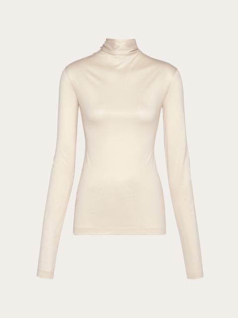 Jersey turtleneck with low cut back