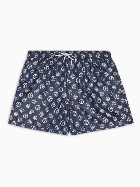 GIORGIO ARMANI Swim trunks with an all-over logo jacquard