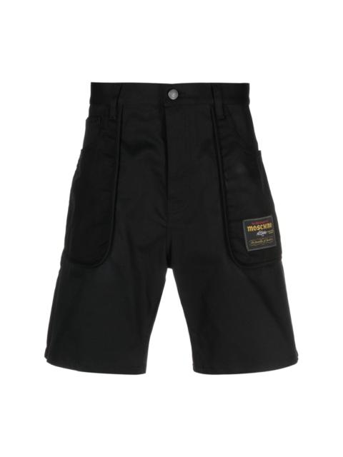 Moschino logo-patch gabardine shorts