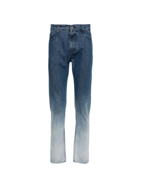 MSGM bleach-wash tapered jeans