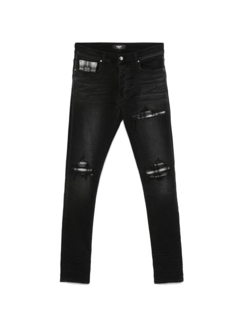 AMIRI ripped-detailing jeans