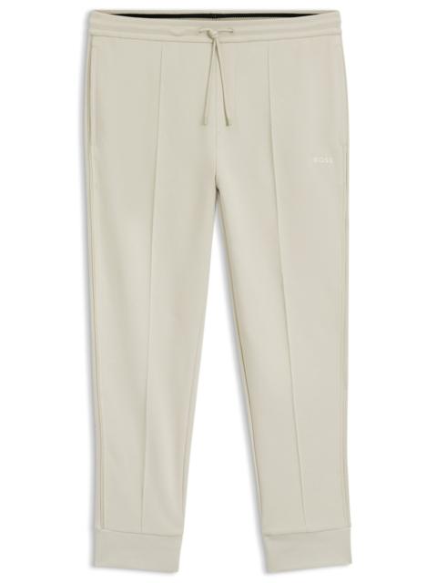 BOSS PIPING-DETAIL TRACKSUIT BOTTOMS IN A COTTON BLEND