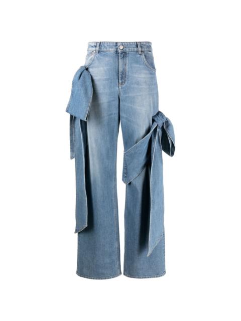 Blumarine bow-detailing wide-leg jeans