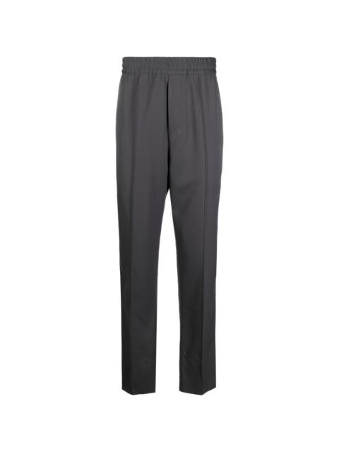 OAMC elasticated tailored-cut trousers
