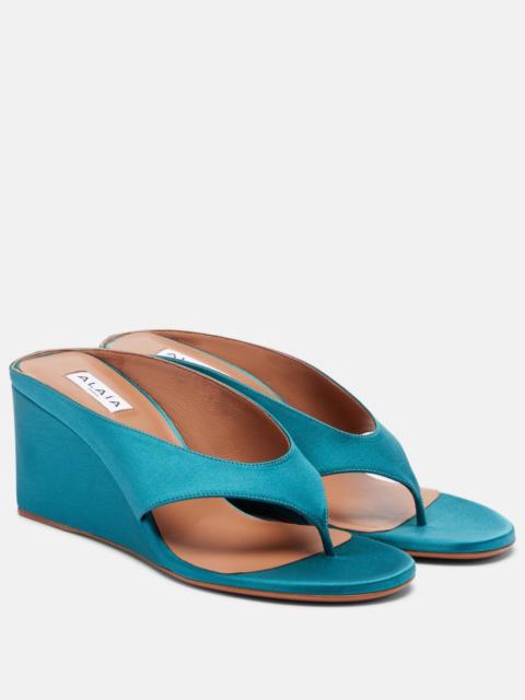 Alaïa Cube satin wedge thong sandals