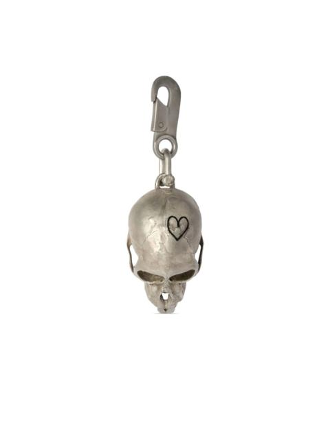 Parts of Four Monkey Skull charm