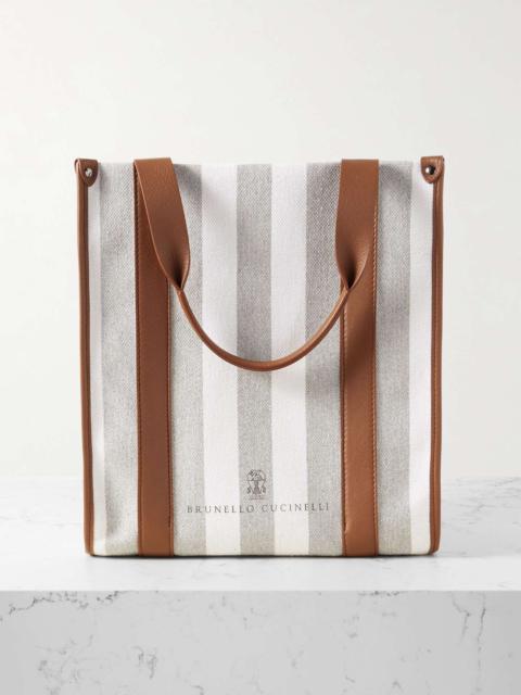 Leather-trimmed striped canvas tote bag