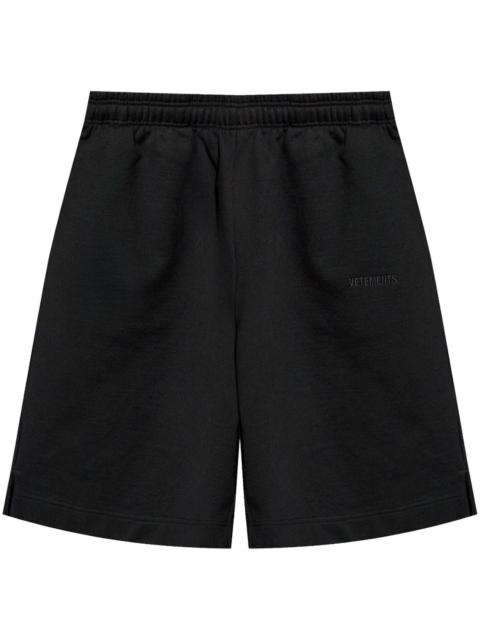 VETEMENTS logo-embroidered track shorts