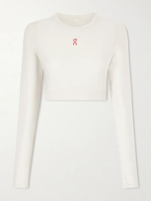 On Year Of The Horse cropped mesh-trimmed stretch recycled top Ivory