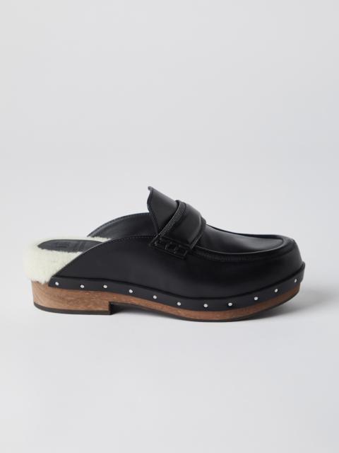 Matte calfskin loafer-style clogs with precious detail and shearling lining