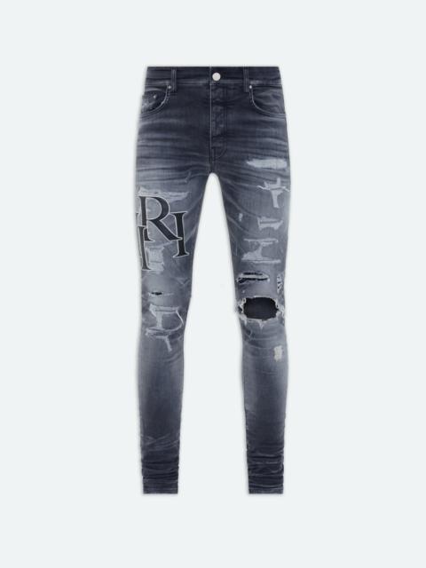 AMIRI STAGGERED LOGO JEAN