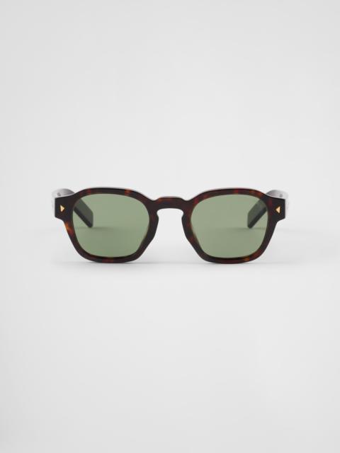 Prada Sunglasses with iconic metal plaque