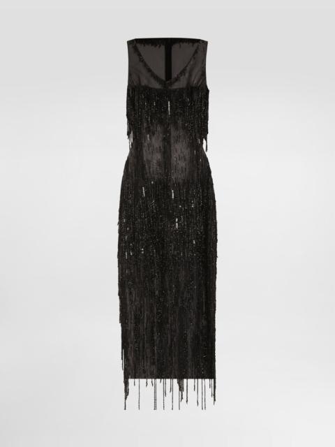 Sleeveless calf-length marquisette dress with sequined fringing