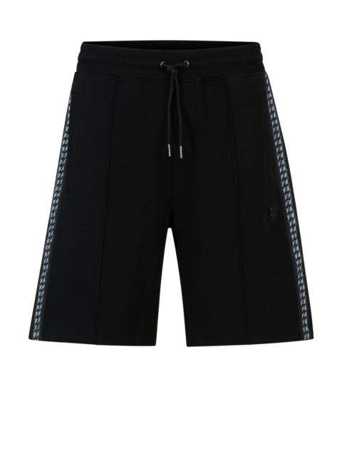 HUGO STRETCH-COTTON RELAXED-FIT SHORTS WITH STACKED LOGO