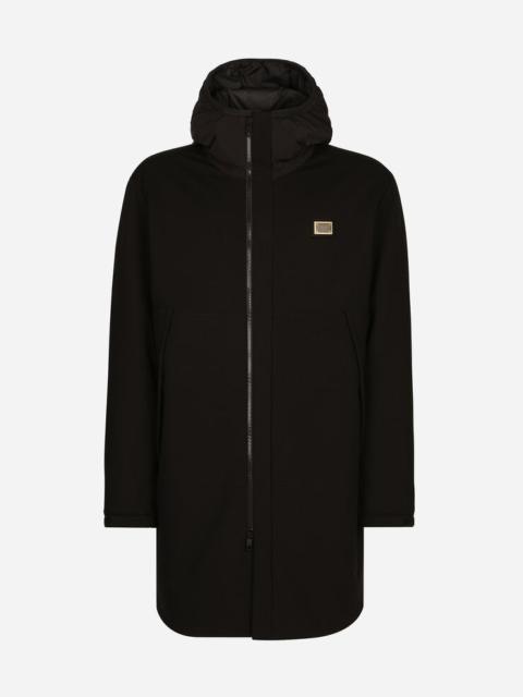 Stretch jersey parka with hood and tag