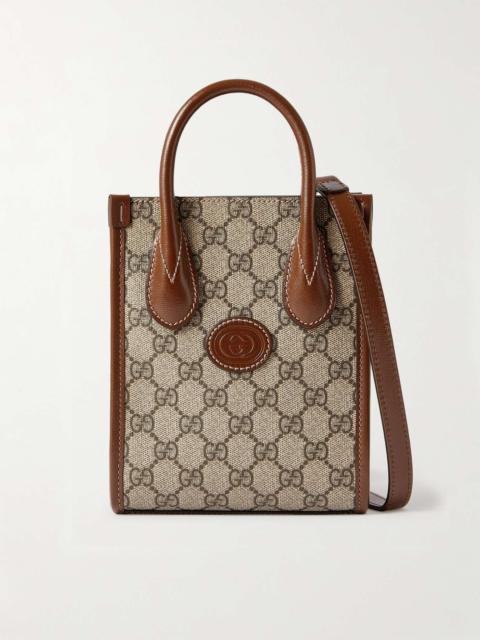 GUCCI Leather-Trimmed Monogrammed Coated-Canvas Messenger Bag