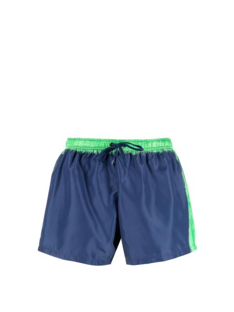 Moschino paint-effect logo swim shorts