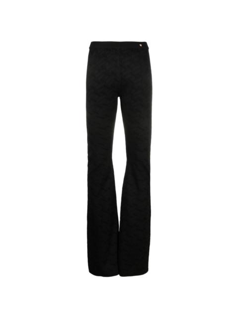 Greca-knit flared trousers