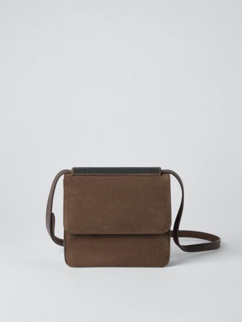 Suede bag with precious insert