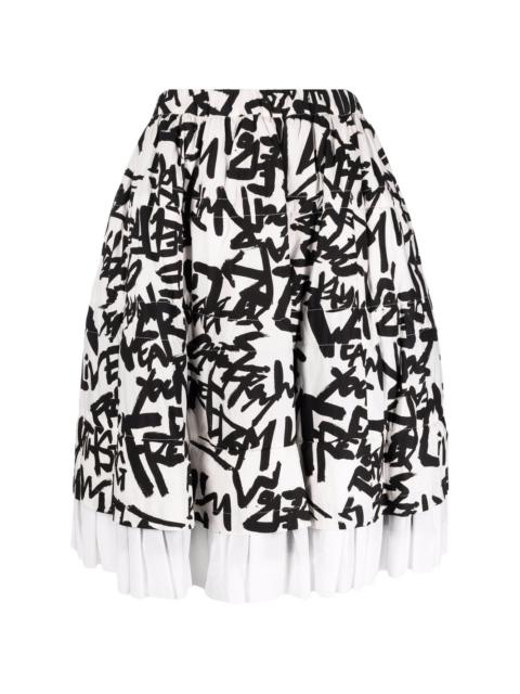 Comme Des Garçons Live Free-print skirt