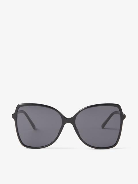 Fede
Black Round-Frame Sunglasses with Glitter Temples