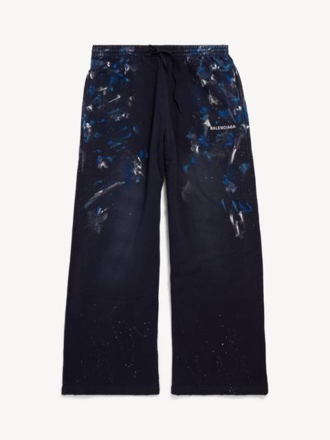 BALENCIAGA Men's Paint Splatter Oversized Baggy Sweatpants in Navy