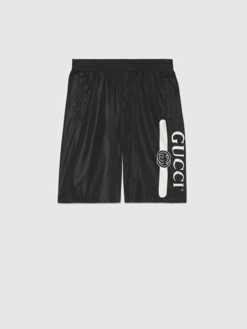 GUCCI Gucci logo print swim shorts