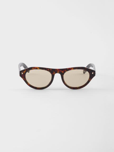 Prada Prada sunglasses with the iconic metal plaque