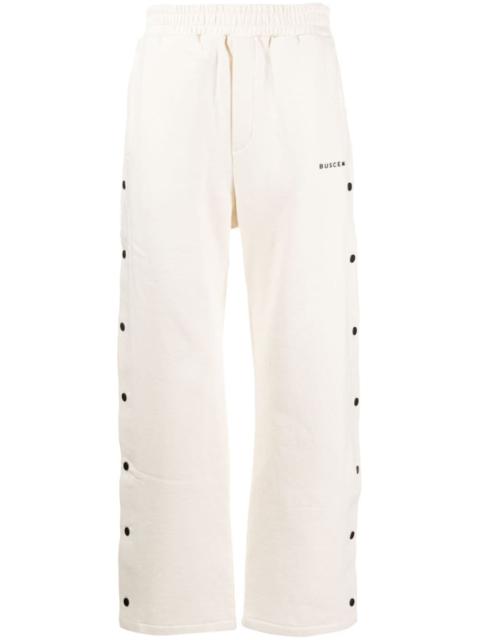 button-embellished track pants