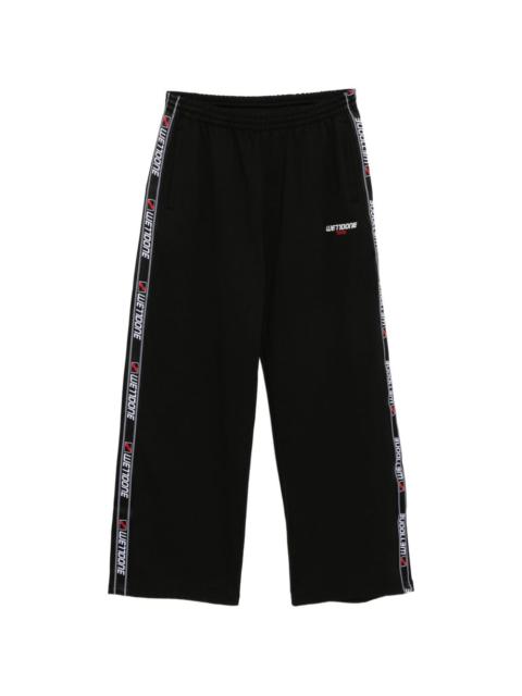 We11done logo-tape trousers