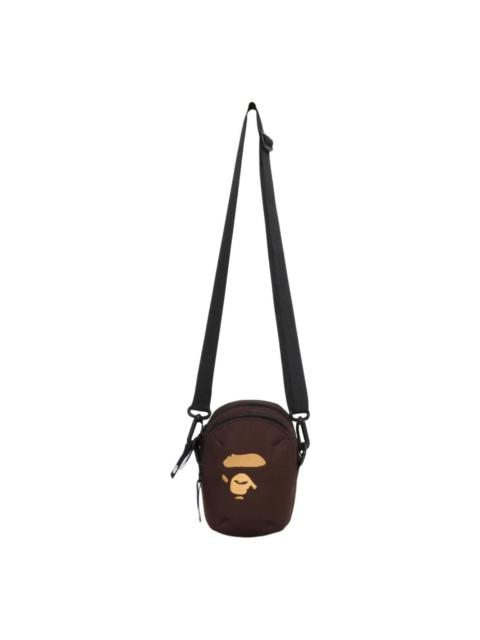 A BATHING APE® A Bathing Ape Ape Head Camera Pouch M Travel 'Brown' 0ZXBGMX00490QBWX