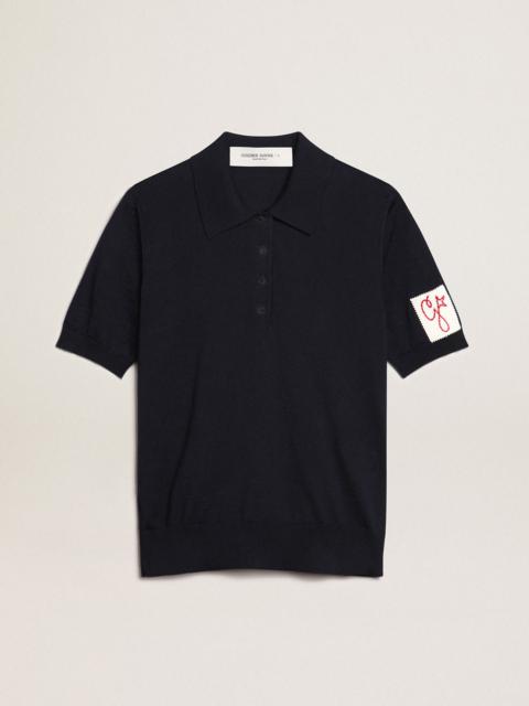 Women’s polo shirt in navy-blue merino wool