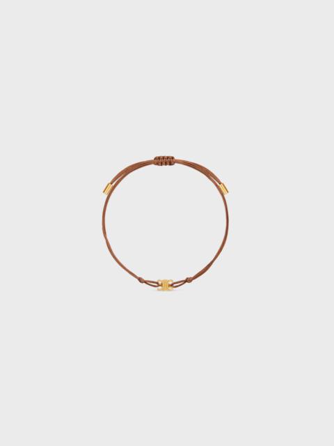 CELINE Triomphe Thin Beach Bracelet in Brass With Gold Finish and Polyester