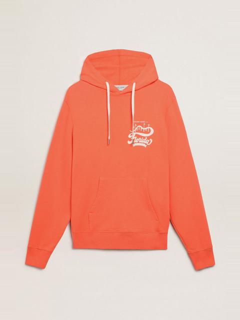 Golden Goose Coral-colored Journey Collection sweatshirt with double white print on the back