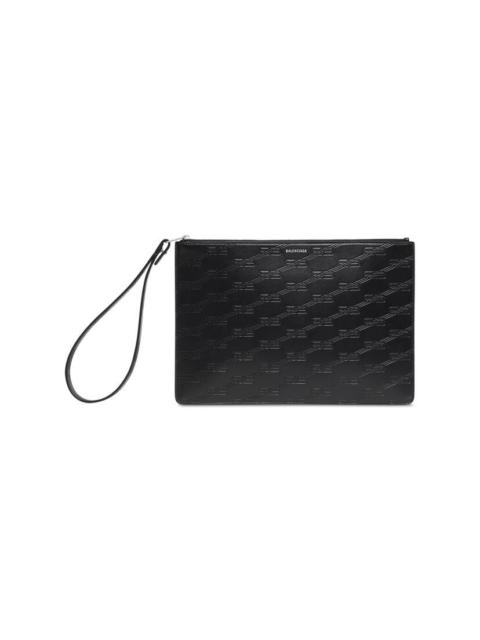 embossed monogram medium pouch with handle in box