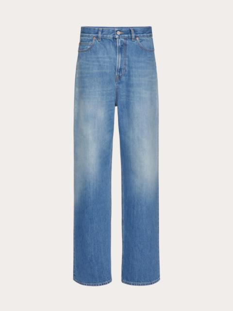 Valentino BLUE WASHED DENIM JEANS WITH VALENTINO ARCHIVE 1985 PRINT