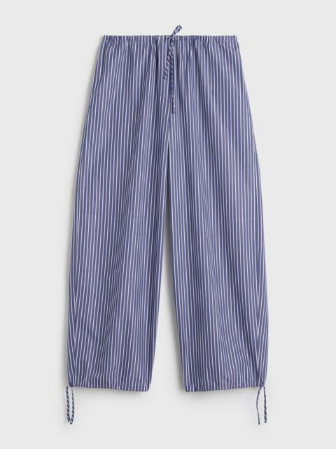 TOTEME Striped drawstring cotton trousers ink blue/pink stripe