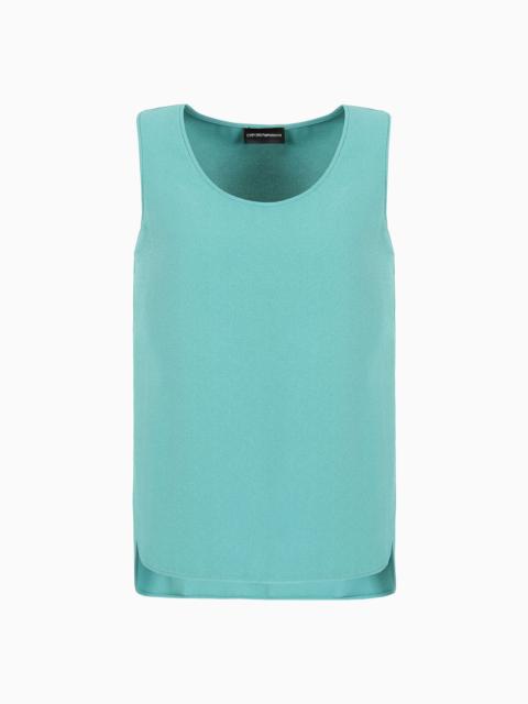 Stretch sablé fabric top with side slits