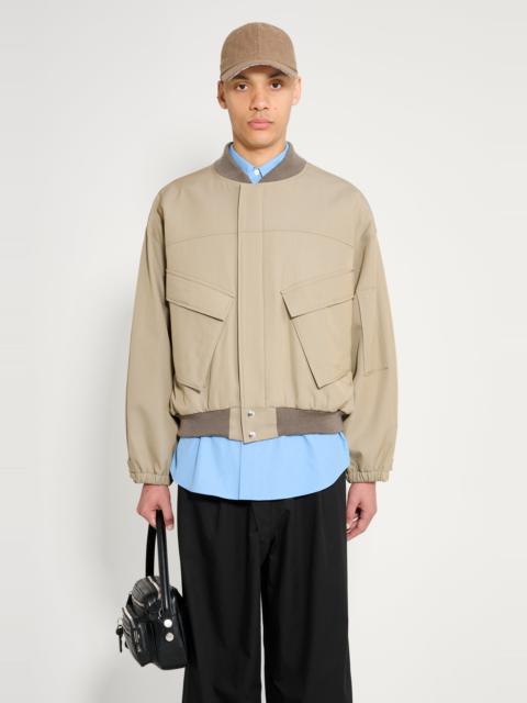 AURALEE AURALEE LIGHT WOOL MAX GABARDINE CHAMBRAY PADDED FLIGHT BLOUSON KHAKI BEIGE